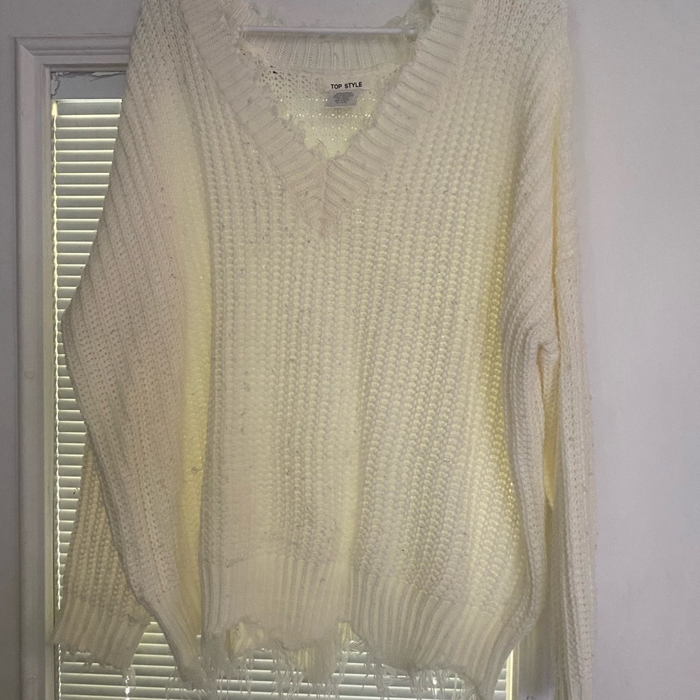 Top Style sweater with string detail at top and bottom
